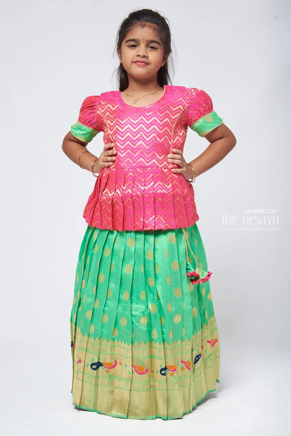 Trendy Zig Zag Pink Peplum Blouse with Zari Butta Green Pattu Pavadai: Heritage Silk Collection