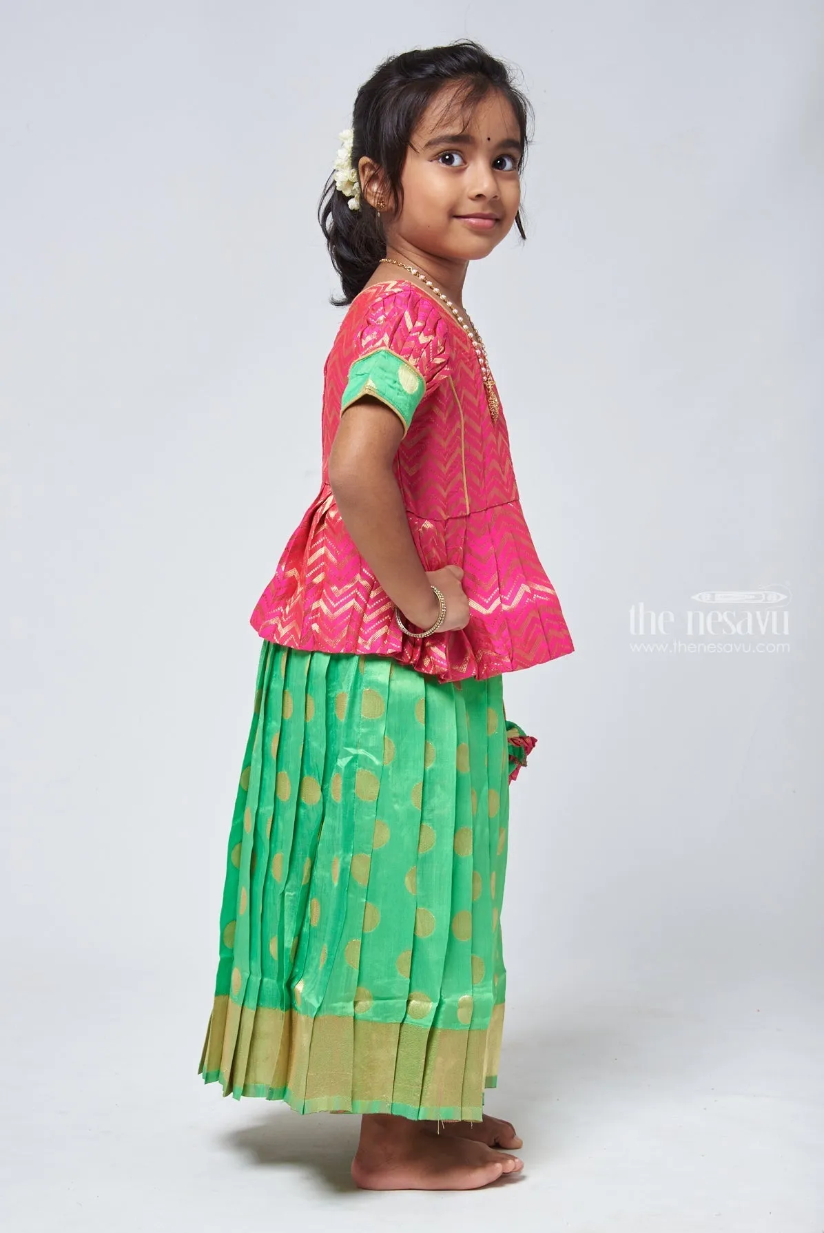 Trendy Zig Zag Pink Peplum Blouse with Zari Butta Green Pattu Pavadai: Heritage Silk Collection