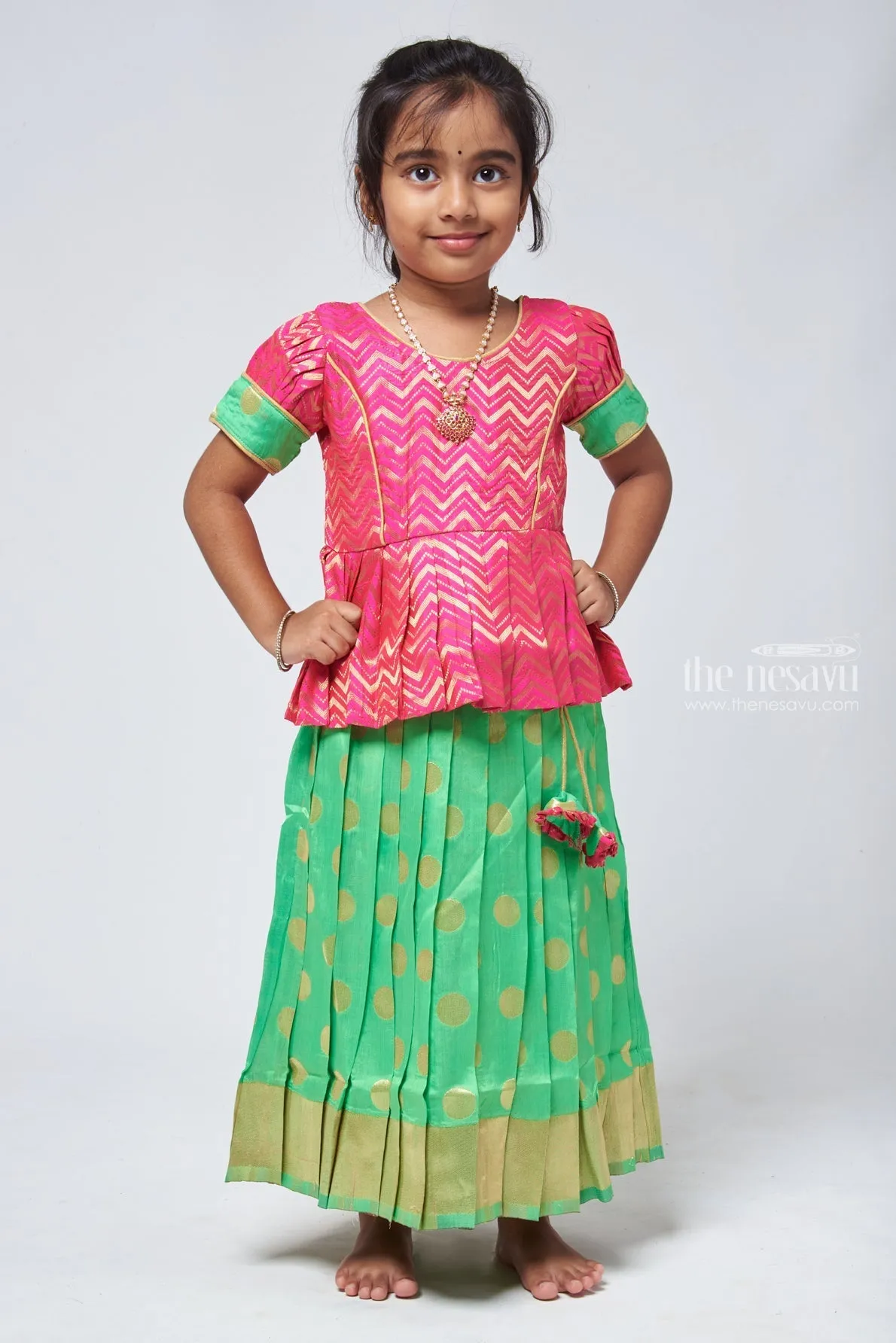 Trendy Zig Zag Pink Peplum Blouse with Zari Butta Green Pattu Pavadai: Heritage Silk Collection