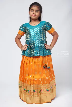 Vibrant Zig Zag Green Peplum Blouse with Zari Butta Orange Pattu Pavadai: Traditional Festive Charm